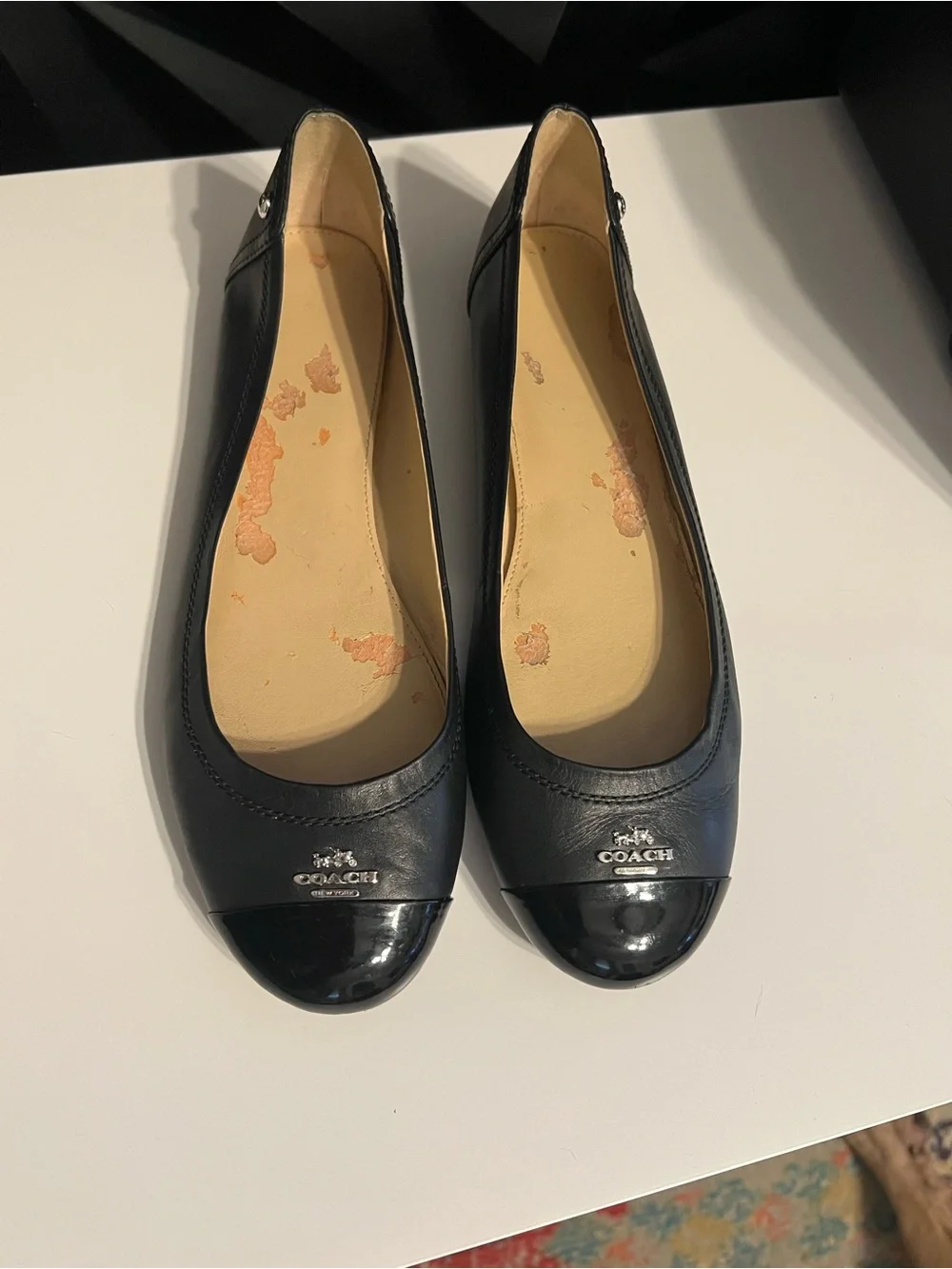 Coach sleek black